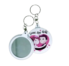 Keychain mirror button